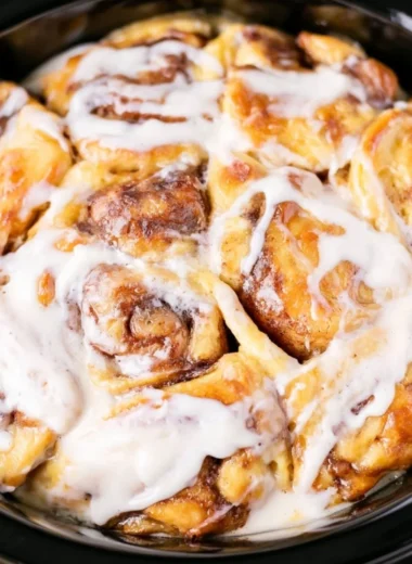 Delicious Crockpot Cinnamon Roll Casserole ready to serve.