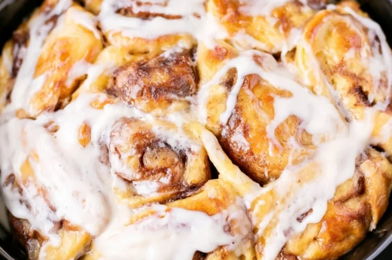 Delicious Crockpot Cinnamon Roll Casserole ready to serve.