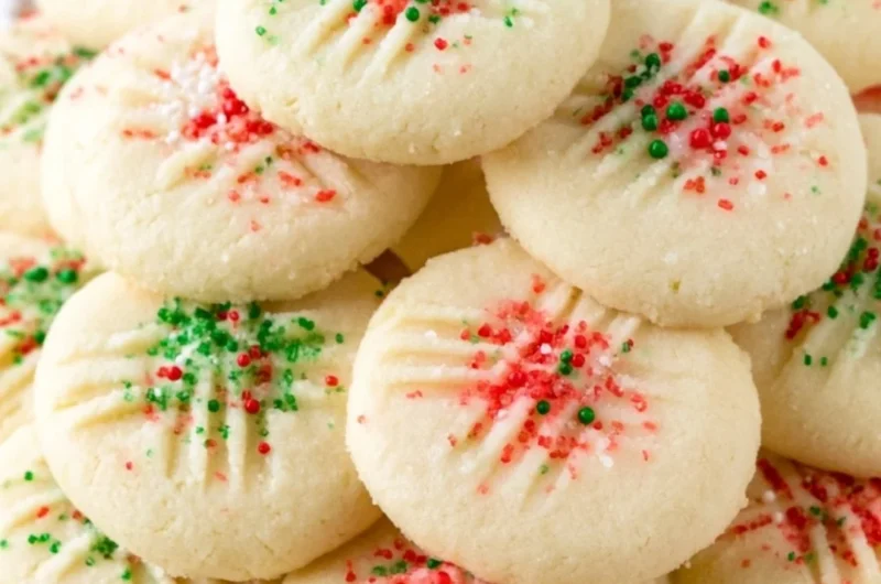 Delicious whipped shortbread cookies on a plate, perfect for any occasion.