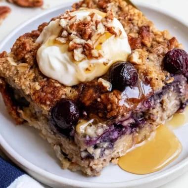 Delicious blueberry baked oatmeal served in a bowl with fresh berries