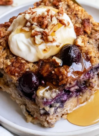 Delicious blueberry baked oatmeal served in a bowl with fresh berries