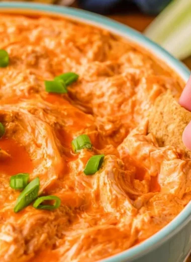 Delicious Buffalo Chicken Dip served in a bowl, perfect for parties.