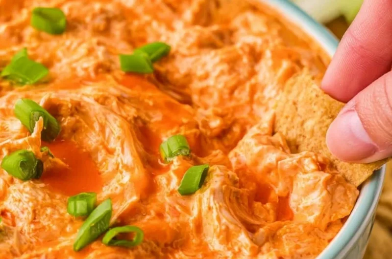 Delicious Buffalo Chicken Dip served in a bowl, perfect for parties.