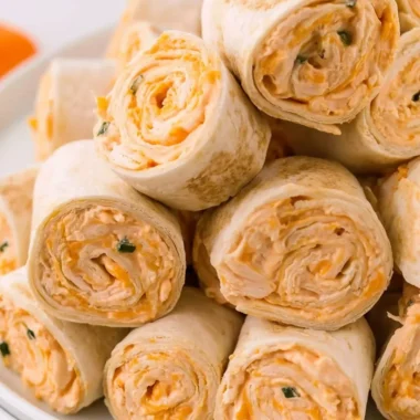 Delicious Buffalo Chicken Pinwheels appetizer plated and ready to serve.