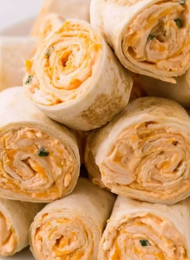 Delicious Buffalo Chicken Pinwheels appetizer plated and ready to serve.