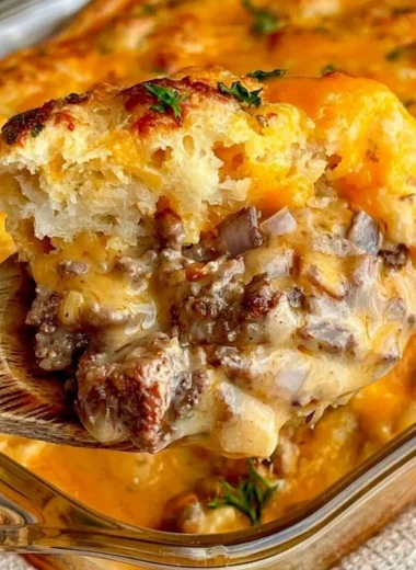 Cheddar Bay Ground Beef Cobbler topped with cheese and flaky biscuit crust