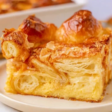 Delicious croissant French toast bake served on a plate.