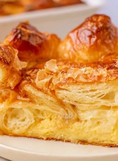 Delicious croissant French toast bake served on a plate.