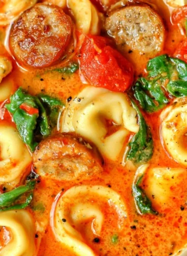 Healthy tortellini soup served in a bowl, perfect for fall dinners.
