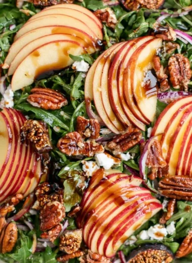 Fresh Apple Arugula Salad with slices of apple and arugula leaves