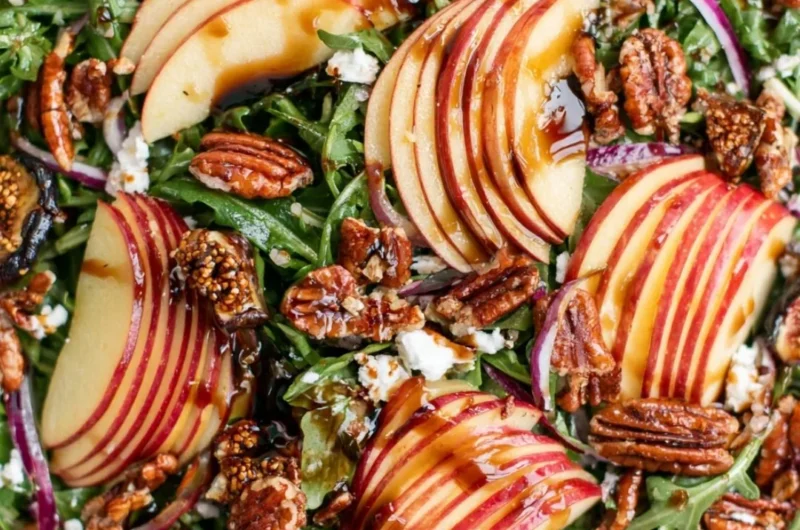 Fresh Apple Arugula Salad with slices of apple and arugula leaves